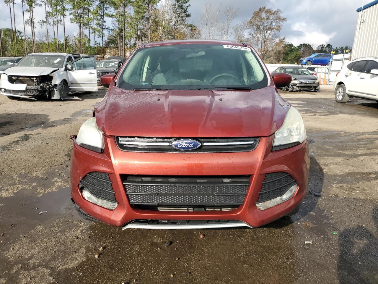 2015 Ford Escape VIN 1FMCU0G92FUB03942 Copart auction photo, all over damage thumbnail 5