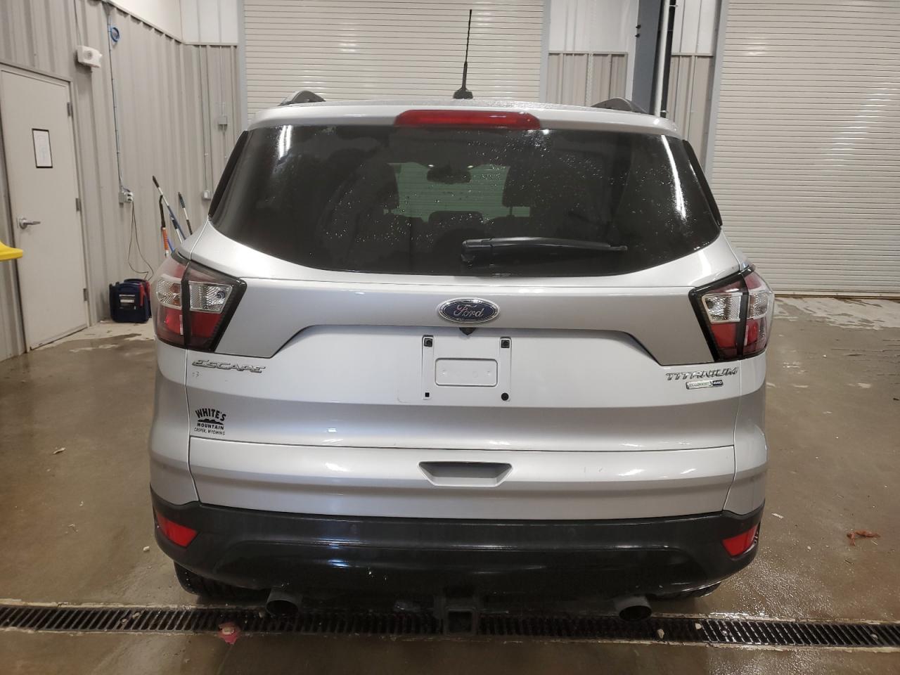 2017 Ford Escape VIN 1FMCU9J9XHUE23798 Copart auction photo, side damage thumbnail 6