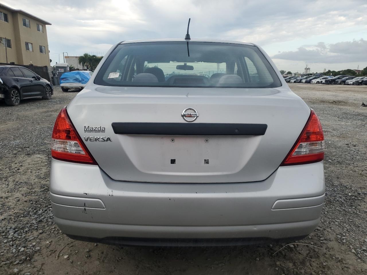 2009 Nissan Versa VIN 3N1CC11E69L446600 Copart auction photo, front end damage thumbnail 6