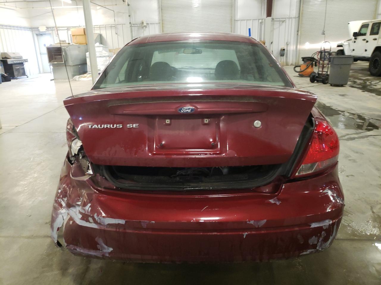 2006 Ford Taurus VIN 1FAFP53U26A147172 Copart auction photo, side / rear end damage thumbnail 6