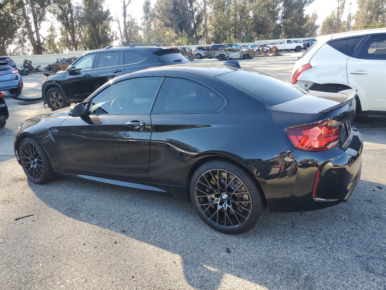 2020 BMW M2 VIN WBS2U7C08L7E69541 Copart auction photo, all over / undercarriage damage thumbnail 2