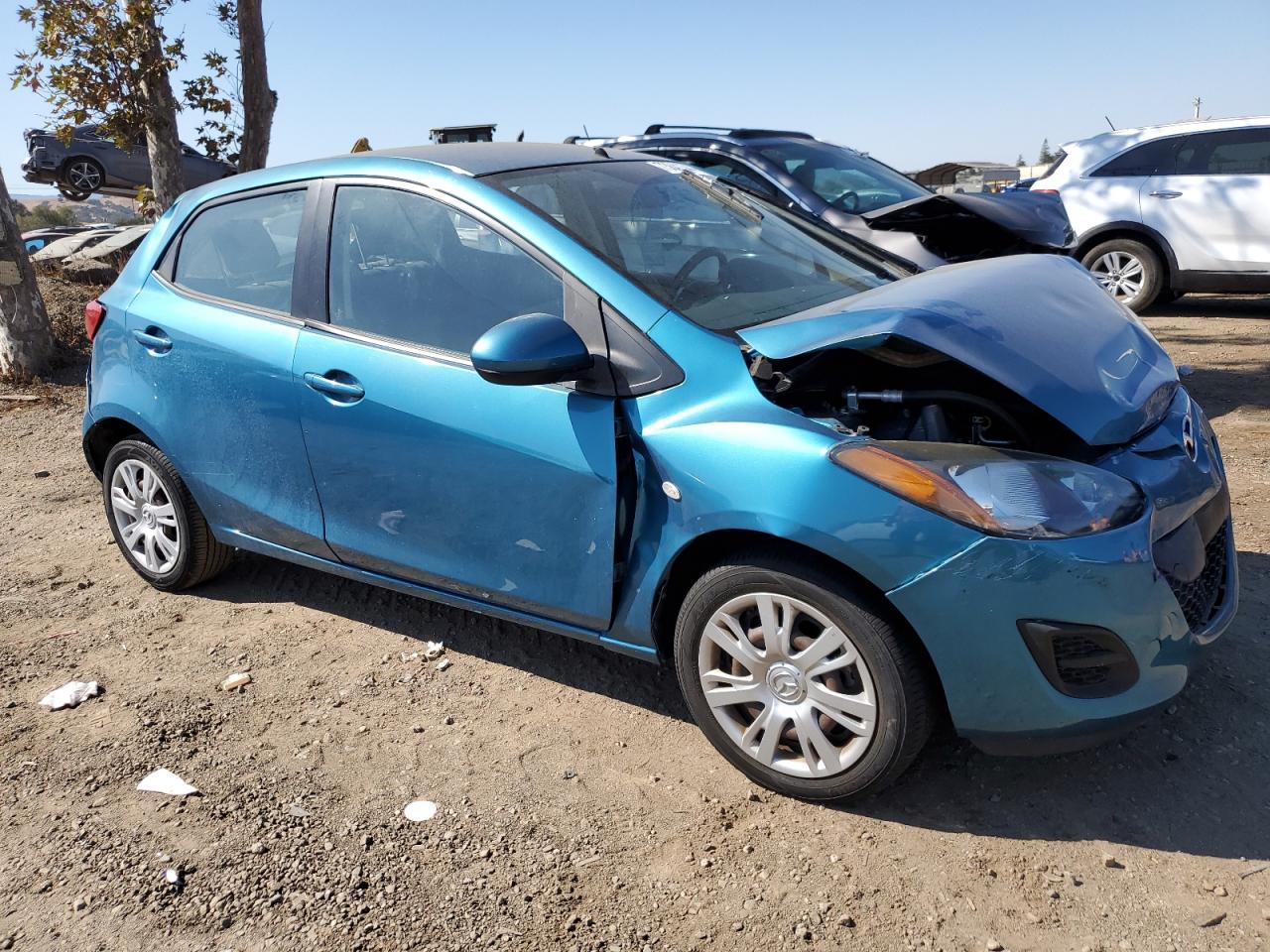 2012 Mazda 2 VIN JM1DE1KZ0C0150392 Copart auction photo, rear end / front end damage thumbnail 4