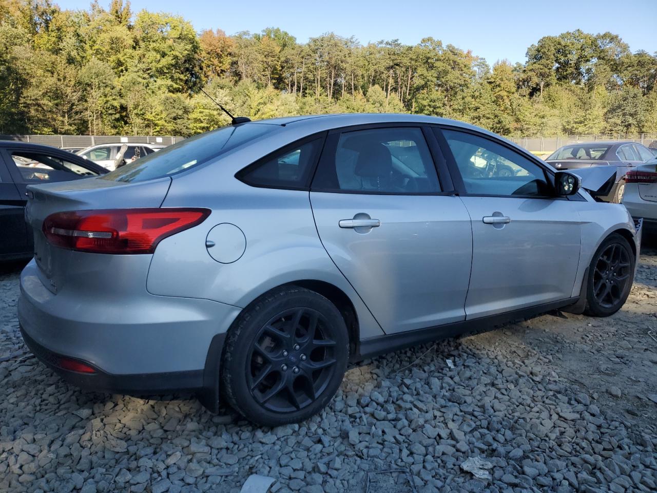 2016 Ford Focus VIN 1FADP3FE4GL257209 Copart auction photo, front end damage thumbnail 3