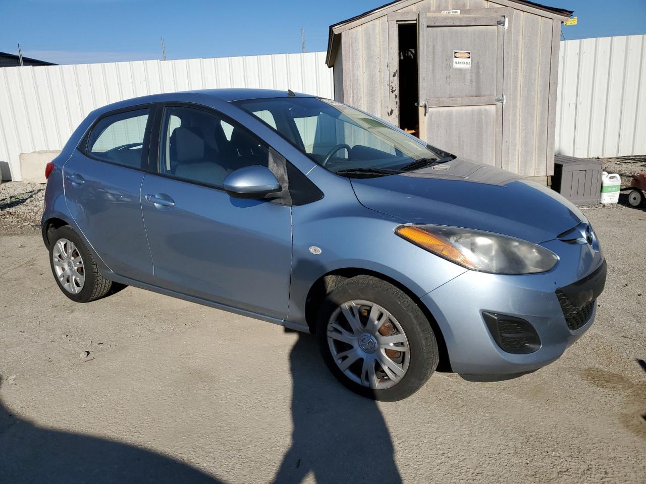 2013 Mazda 2 VIN JM1DE1KY3D0170001 Copart auction photo, side / front end damage thumbnail 4
