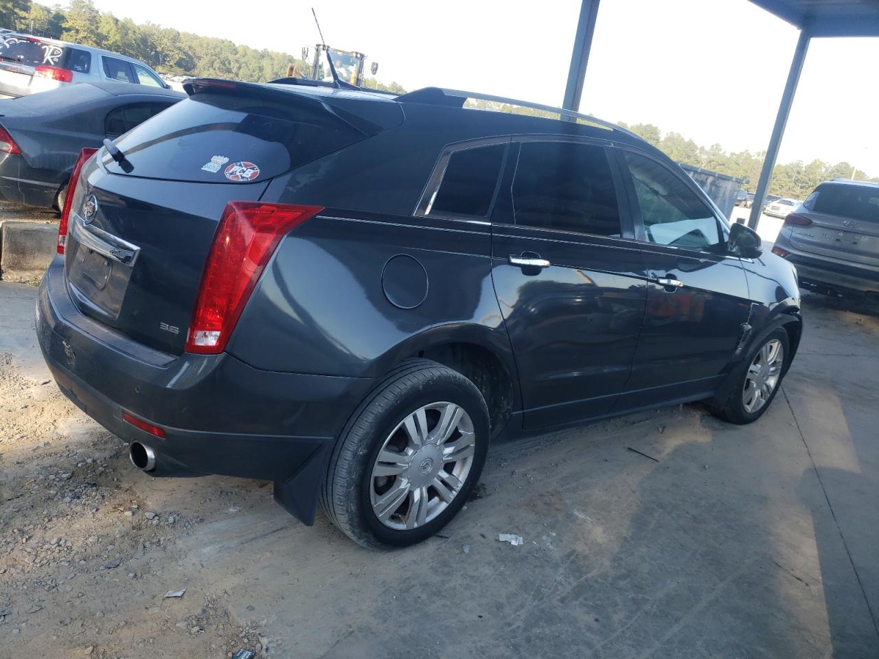 2012 Cadillac SRX VIN 3GYFNAE35CS569258 Copart auction photo, front end damage thumbnail 3