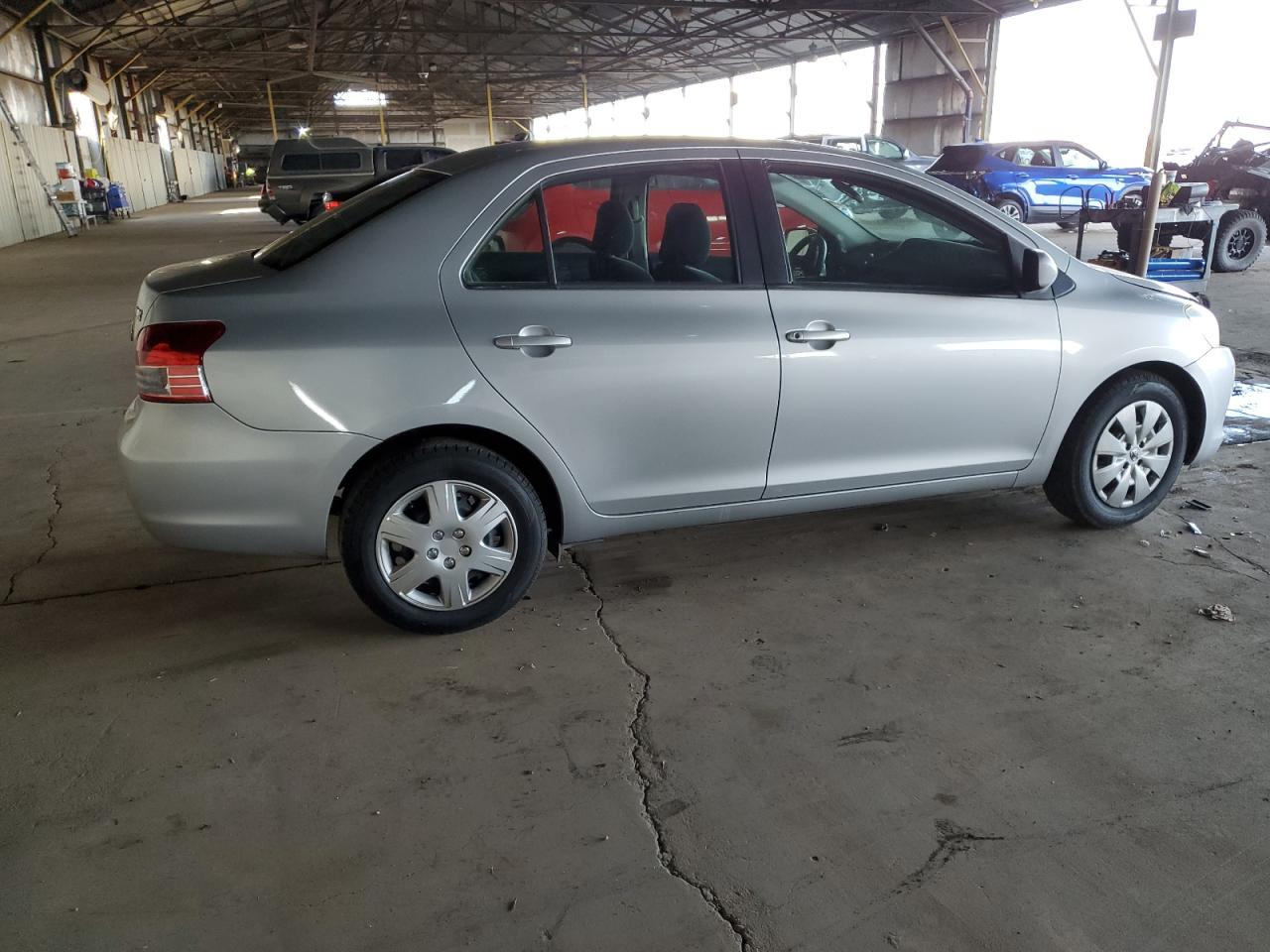 2009 Toyota Yaris VIN JTDBT903891317806 Copart auction photo, undercarriage damage thumbnail 3