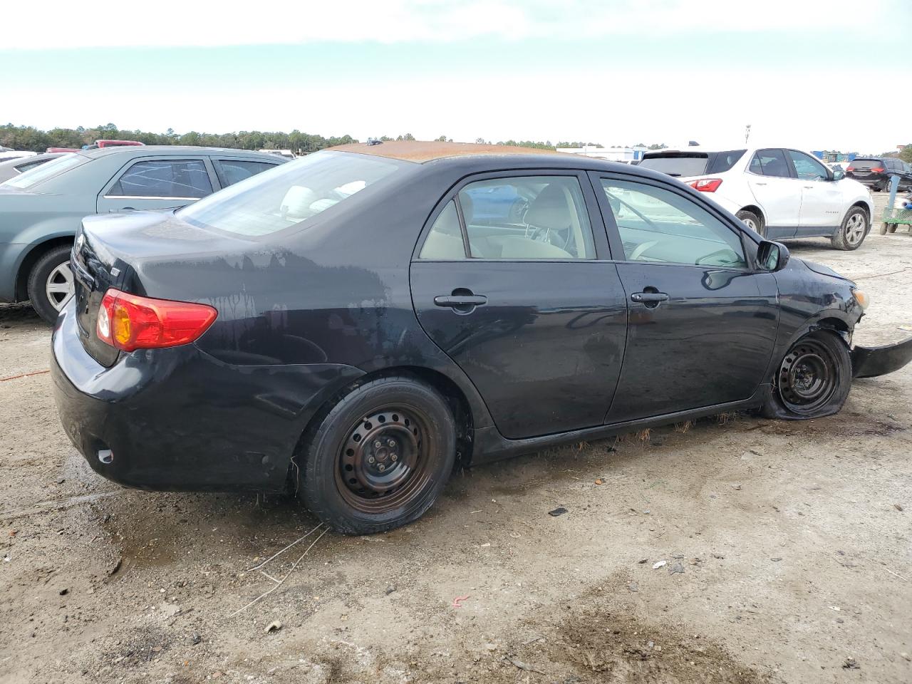 2009 Toyota Corolla VIN JTDBL40E99J048221 Copart auction photo, side / front end damage thumbnail 3