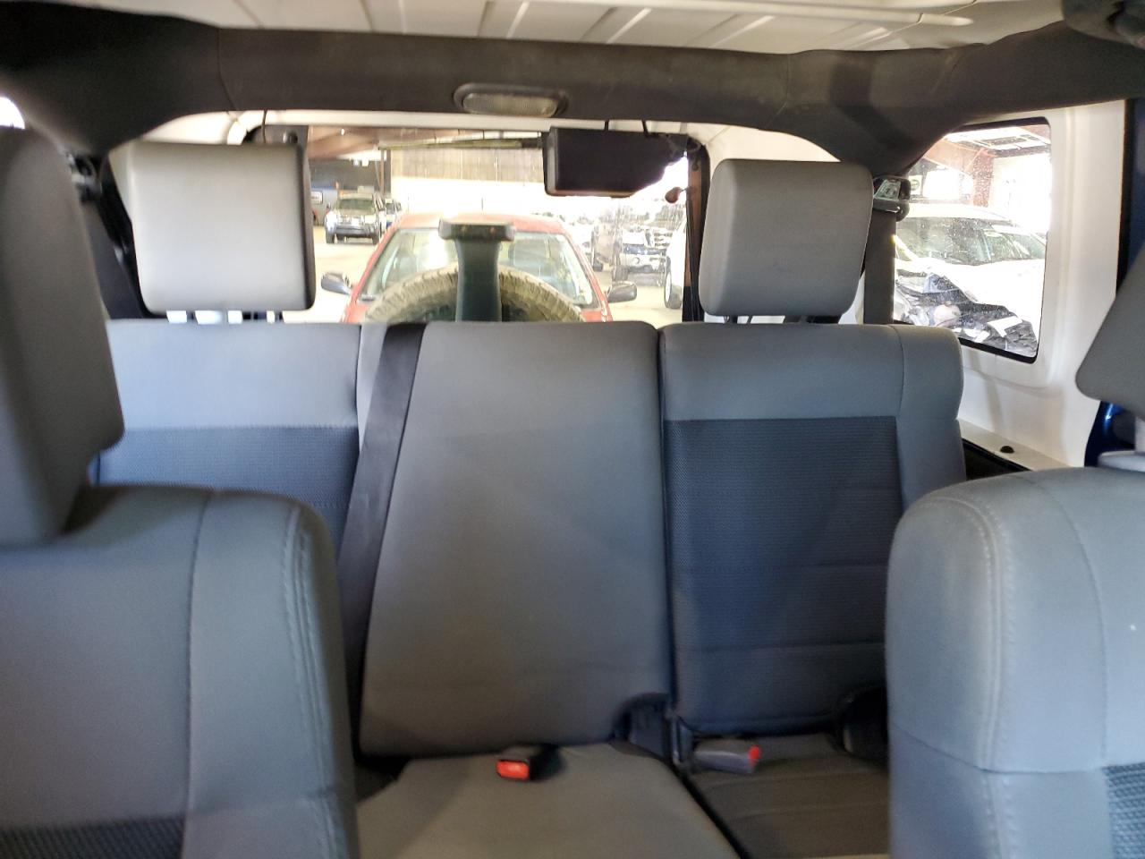 2009 Jeep Wrangler VIN 1J4GZ39159L713502 Copart auction photo, minor dent/scratches damage thumbnail 10