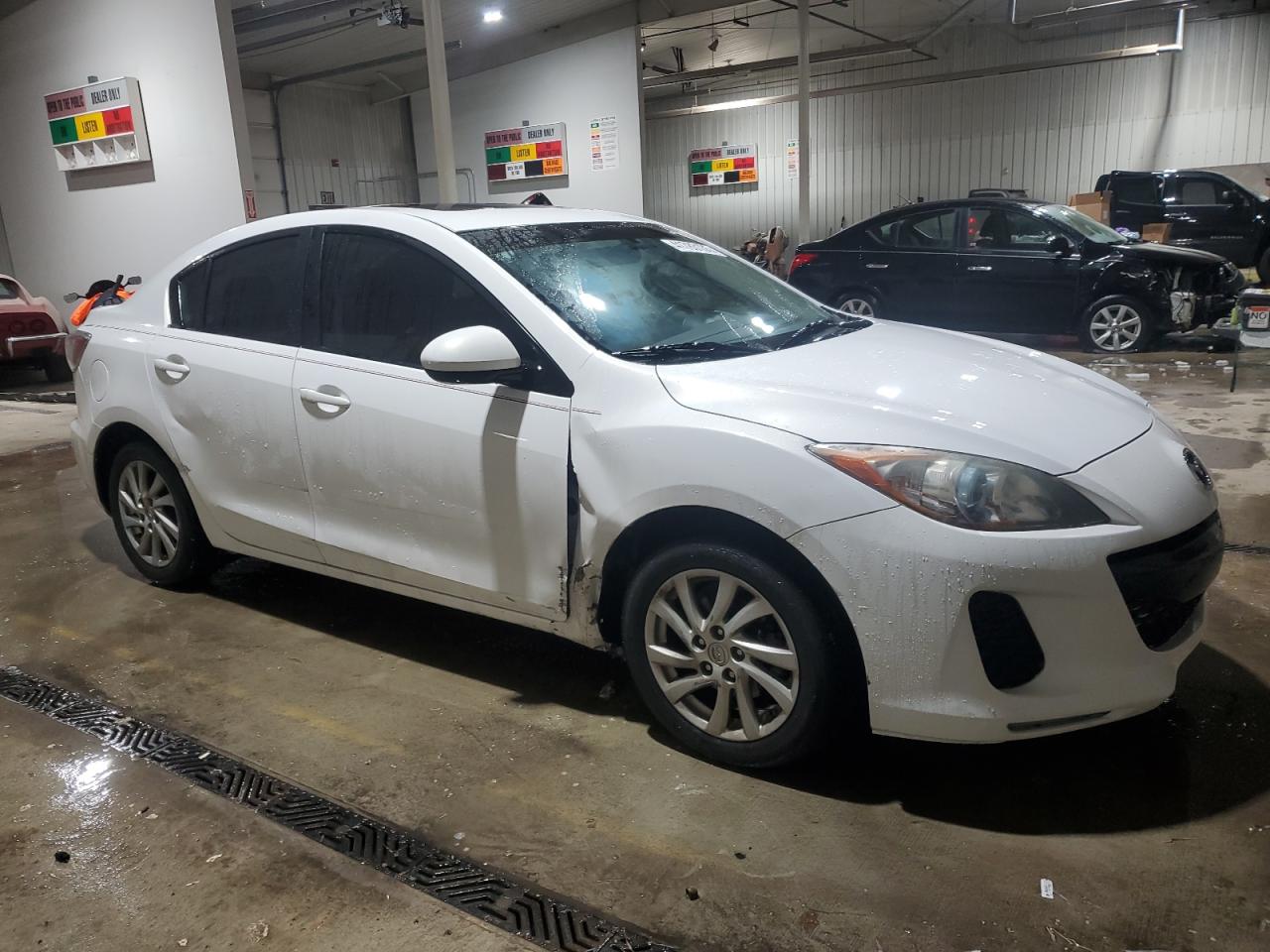 2012 Mazda 3 VIN JM1BL1V85C1678875 Copart auction photo, side / front end damage thumbnail 4
