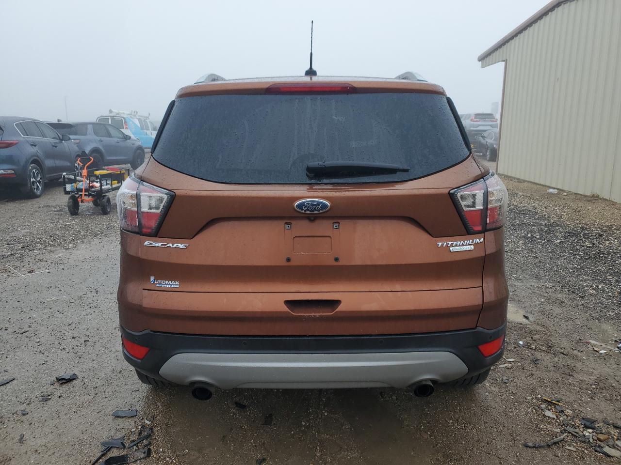 2017 Ford Escape VIN 1FMCU0JDXHUB02019 Copart auction photo, front end damage thumbnail 6