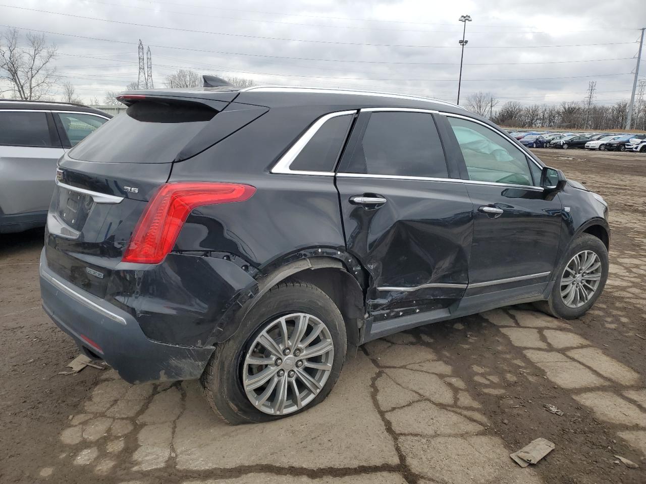 2019 Cadillac XT5 VIN 1GYKNDRS9KZ193926 Copart auction photo, rear end / side damage thumbnail 3