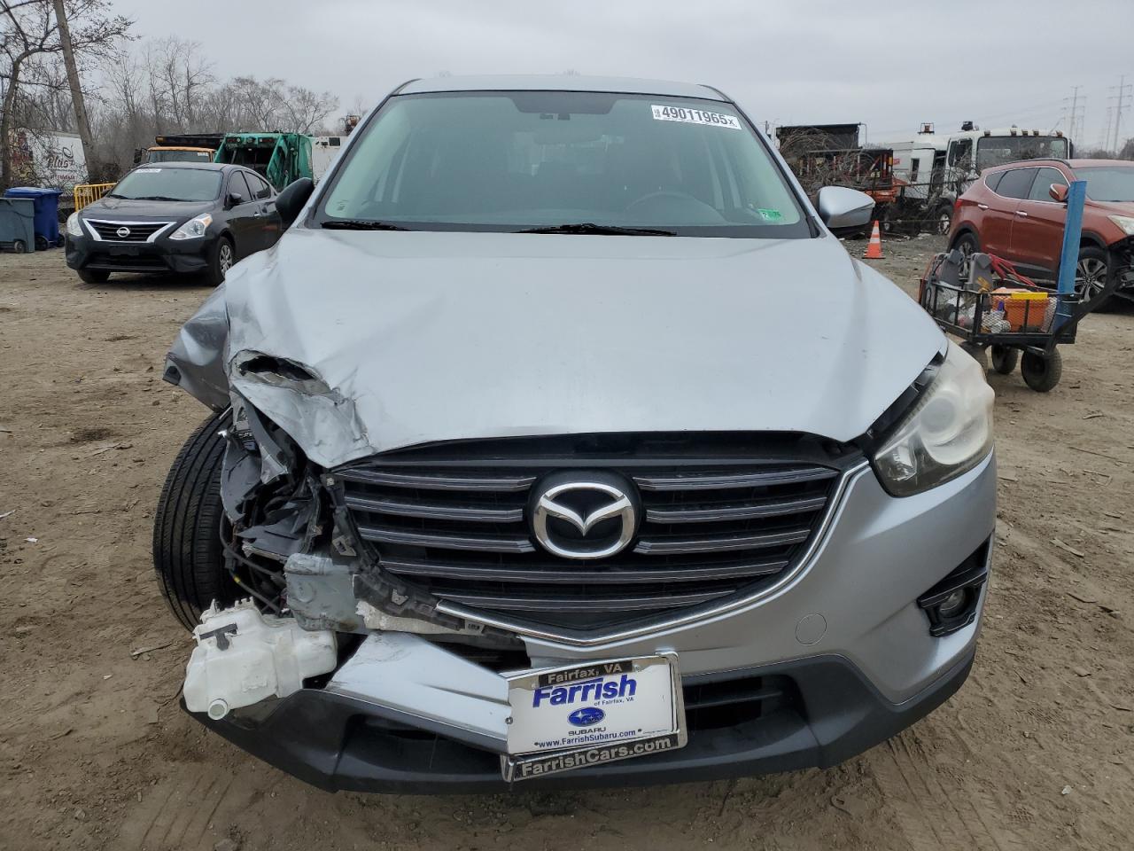 2016 Mazda CX-5 VIN JM3KE2CY8G0608244 Copart auction photo, front end damage thumbnail 5