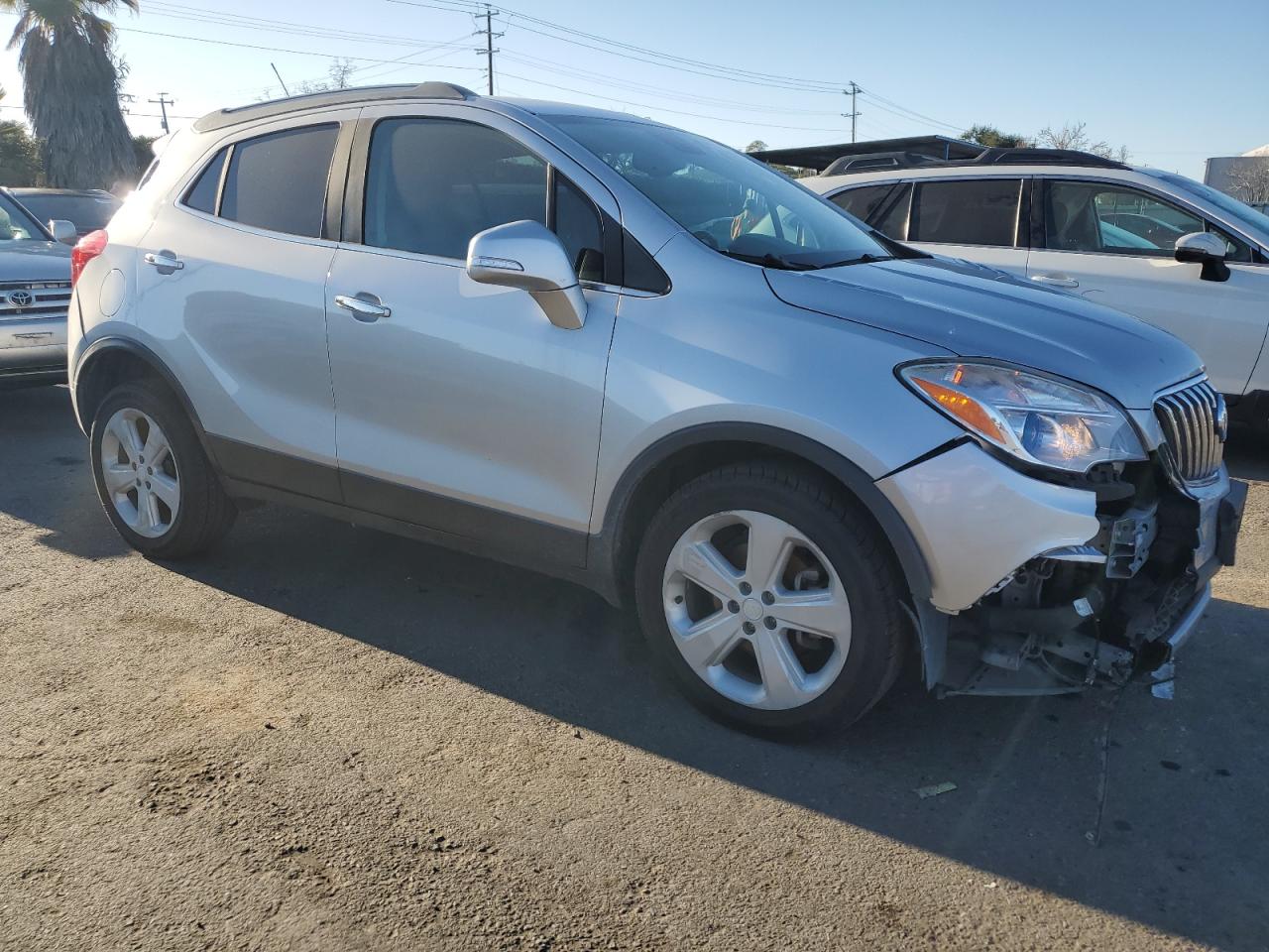 2015 Buick Encore VIN KL4CJCSB9FB257319 Copart auction photo, front end damage thumbnail 4
