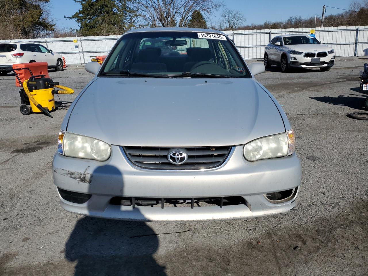 2001 Toyota Corolla VIN 2T1BR12E11C499072 Copart auction photo, front end / side damage thumbnail 5