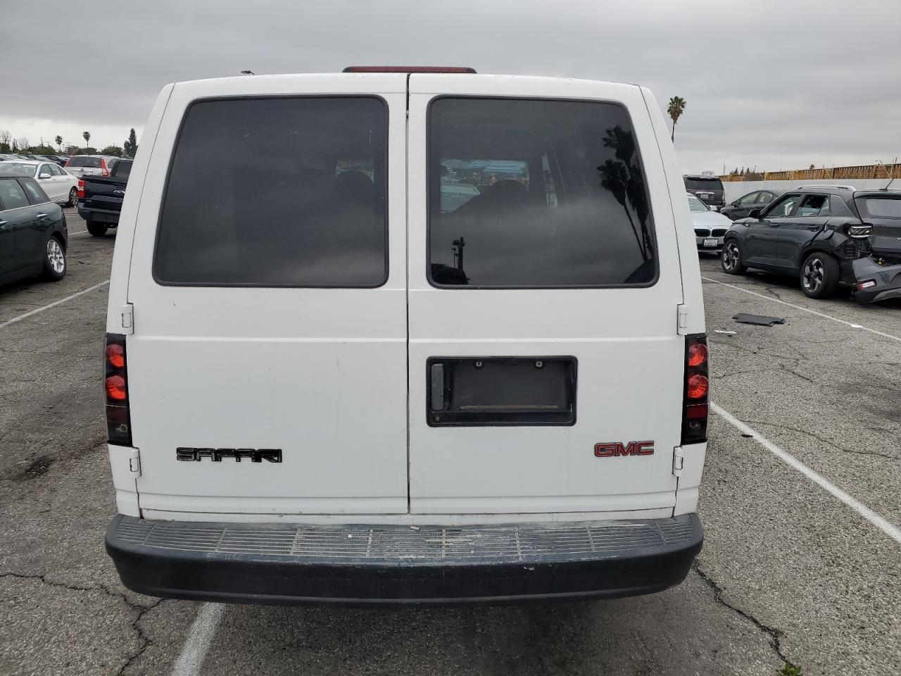 2001 GMC Safari VIN 1GTDM19W31B503787 Copart auction photo, side / rear end damage thumbnail 6