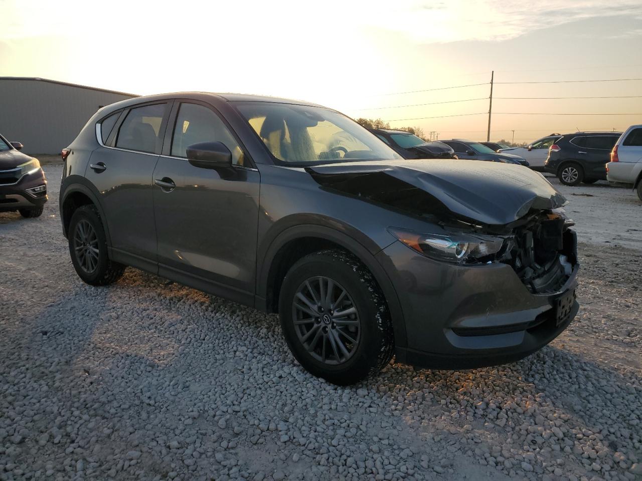 2019 Mazda CX-5 VIN JM3KFACM9K0694502 Copart auction photo, front end / side damage thumbnail 4