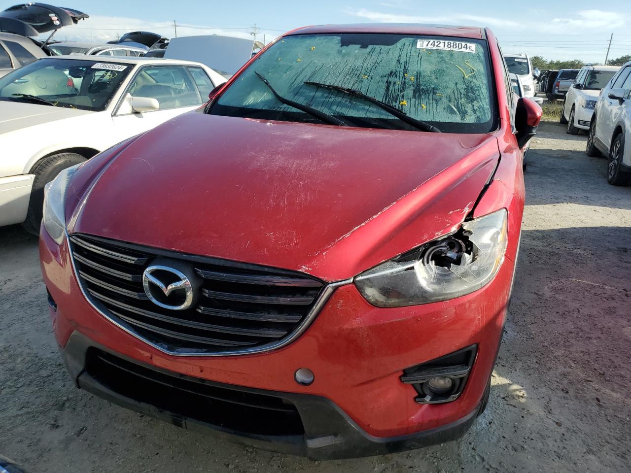 2016 Mazda CX-5 VIN JM3KE4DY8G0883672 Copart auction photo, water/flood / all over damage thumbnail 5