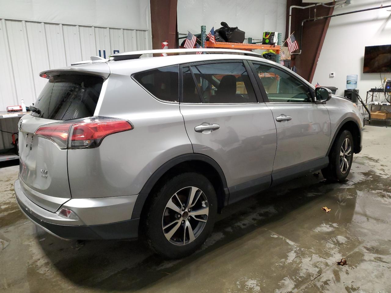 2018 Toyota RAV 4 VIN 2T3RFREV5JW742017 Copart auction photo, front end damage thumbnail 3
