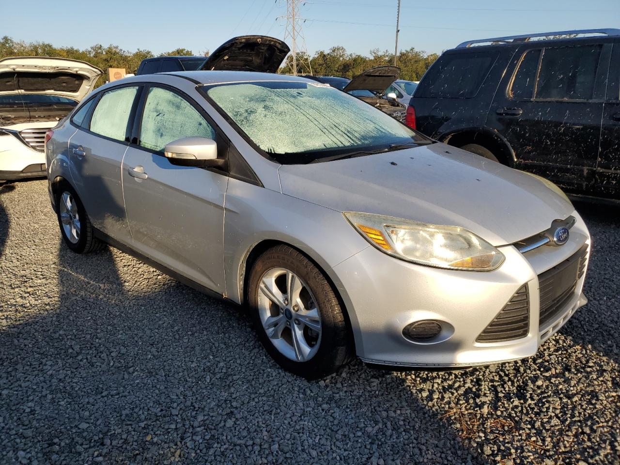2014 Ford Focus VIN 1FADP3F23EL142197 Copart auction photo, water/flood damage thumbnail 4