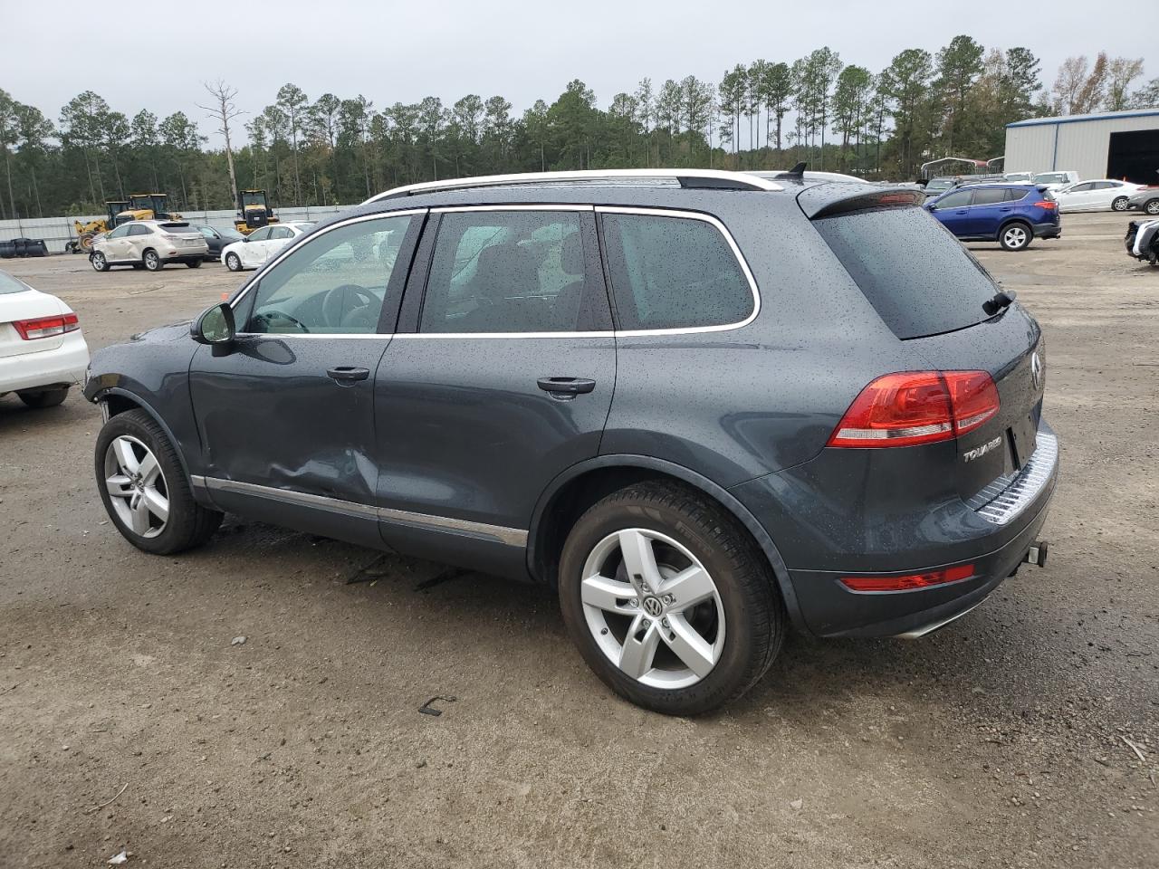 2014 Volkswagen Touareg VIN WVGEP9BP8ED003756 Copart auction photo, front end / side damage thumbnail 2