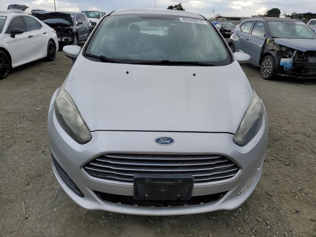 2016 Ford Fiesta VIN 3FADP4TJ7GM170085 Copart auction photo, minor dent/scratches damage thumbnail 5