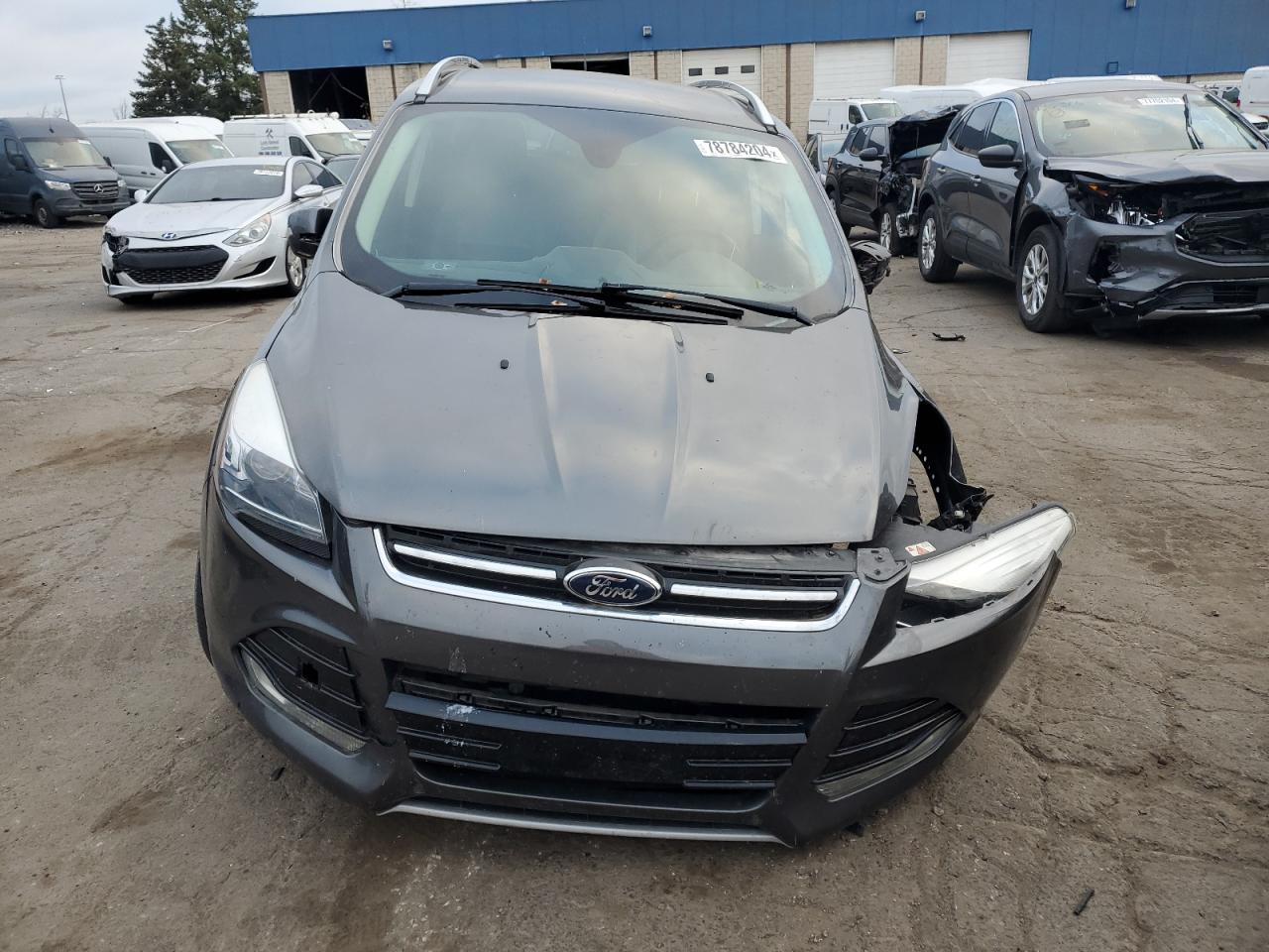 2015 Ford Escape VIN 1FMCU0JX5FUC60663 Copart auction photo, front end / side damage thumbnail 5