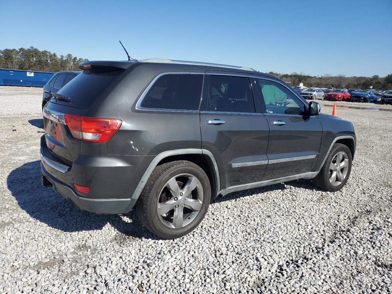 2011 Jeep Grand Cherokee VIN 1J4RR6GT1BC696251 Copart auction photo, minor dent/scratches damage thumbnail 3