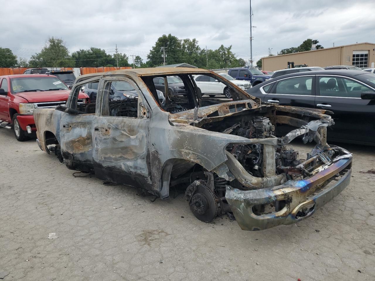 2021 RAM 1500 VIN 1C6SRFFT7MN634859 Copart auction photo, burn damage thumbnail 4
