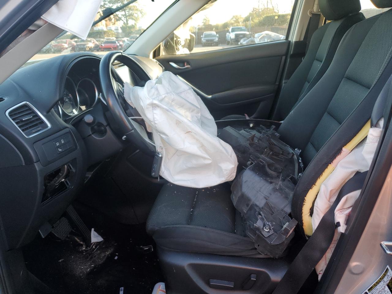 2016 Mazda CX-5 VIN JM3KE2CY6G0788727 Copart auction photo, all over damage thumbnail 7