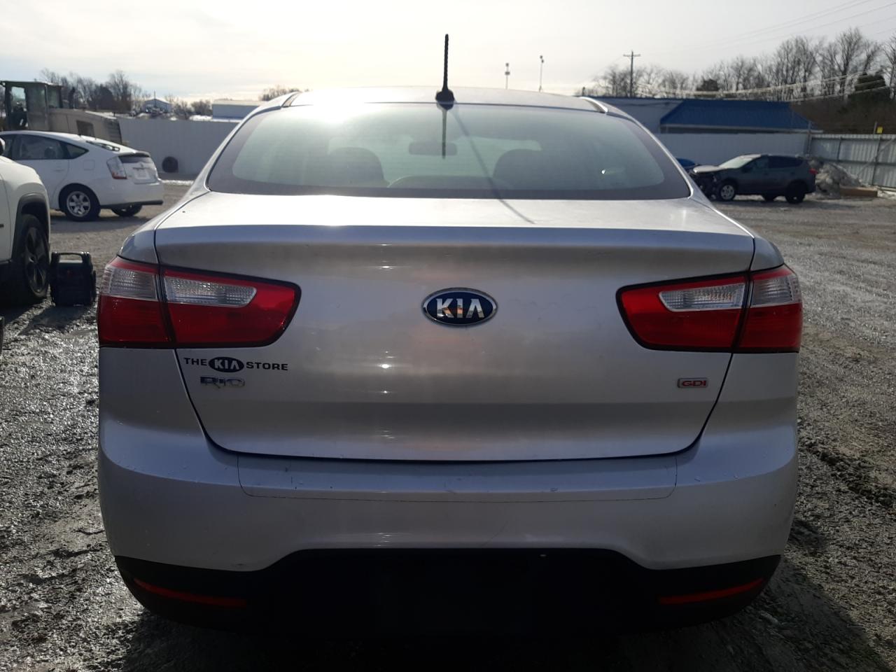 2015 KIA Rio VIN KNADM4A38F6462427 Copart auction photo, side / minor dent/scratches damage thumbnail 6