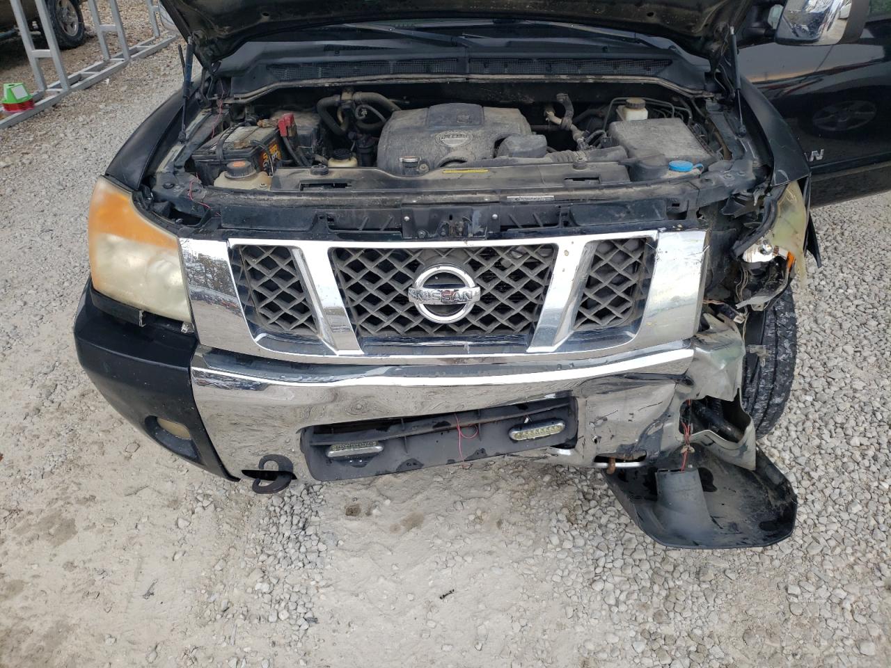 2010 Nissan Titan VIN 1N6AA0EC3AN311489 Copart auction photo, front end / minor dent/scratches damage thumbnail 11