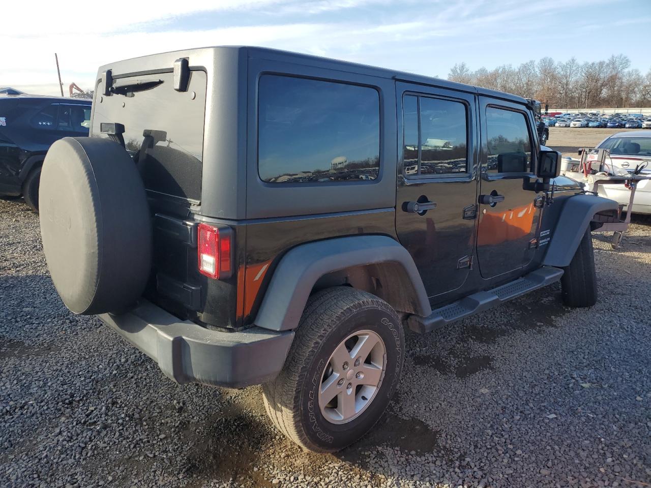 2016 Jeep Wrangler VIN 1C4HJWDG7GL323982 Copart auction photo, front end / side damage thumbnail 3