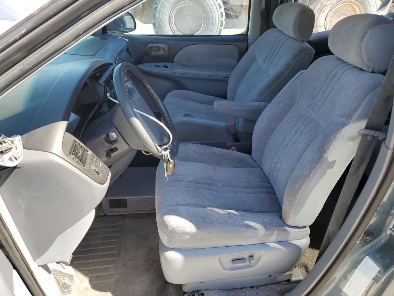 2000 Toyota Sienna VIN 4T3ZF13C2YU267293 Copart auction photo, side damage thumbnail 7