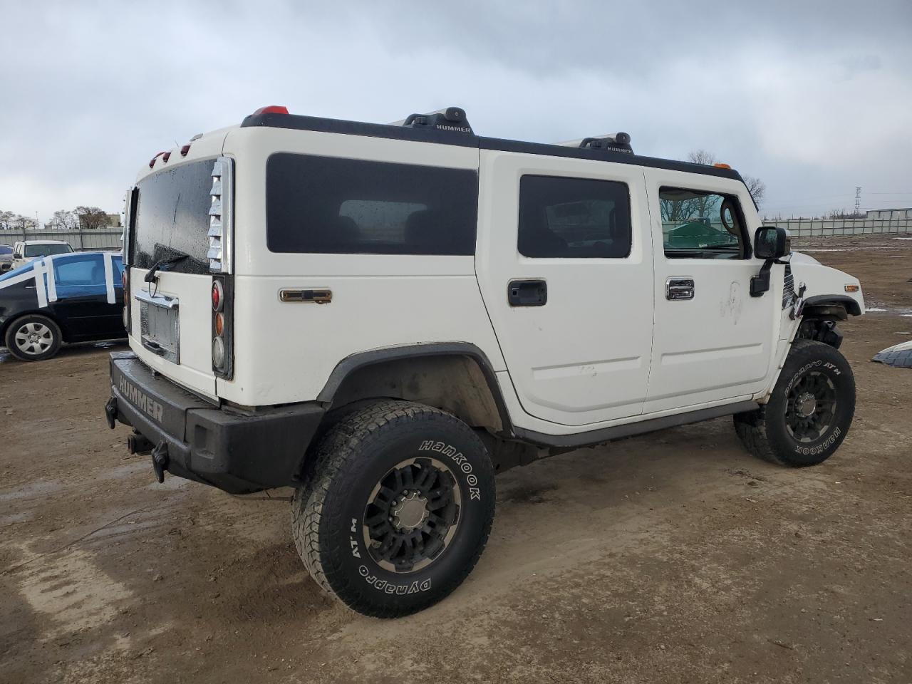 2003 Hummer H2 VIN 5GRGN23U63H106158 Copart auction photo, front end damage thumbnail 3