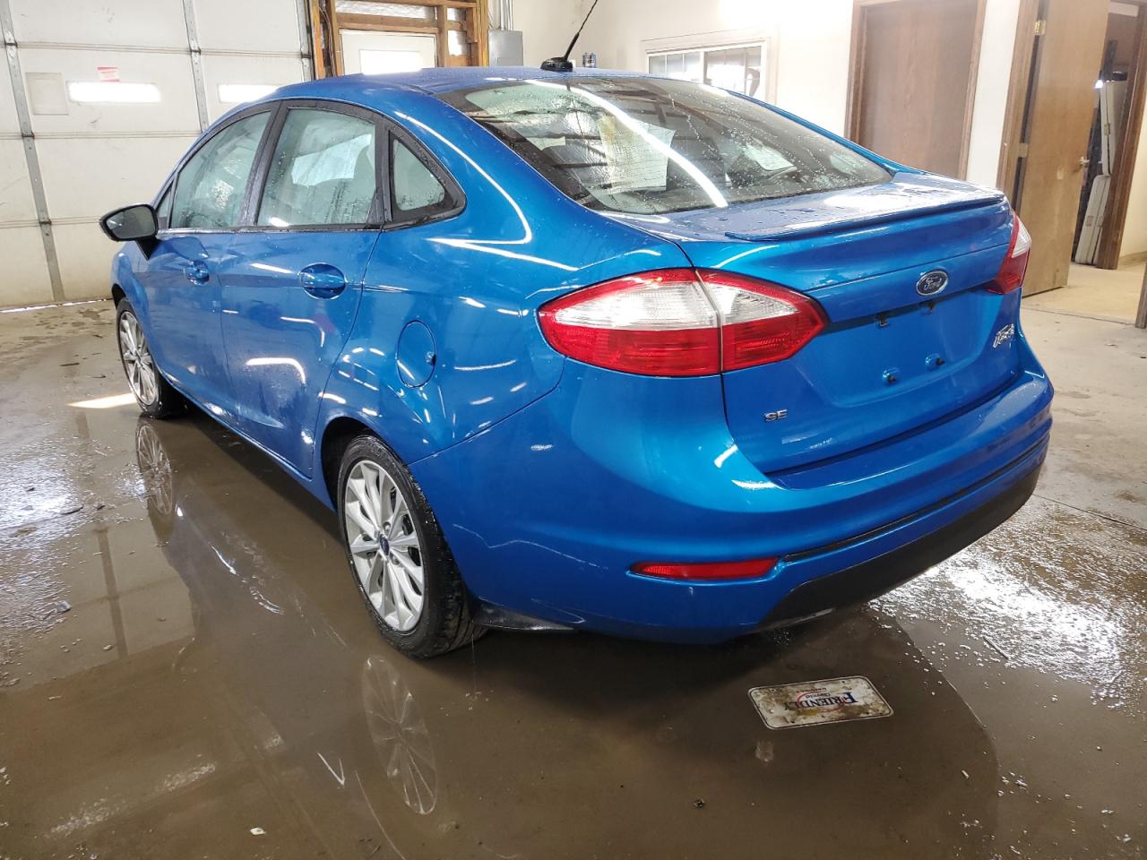 2014 Ford Fiesta VIN 3FADP4BJ1EM205606 Copart auction photo, undercarriage / minor dent/scratches damage thumbnail 2