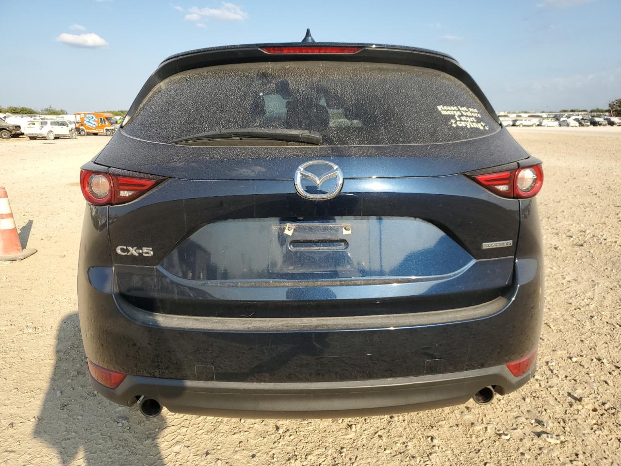 2021 Mazda CX-5 VIN JM3KFADM4M0482348 Copart auction photo, side / minor dent/scratches damage thumbnail 6