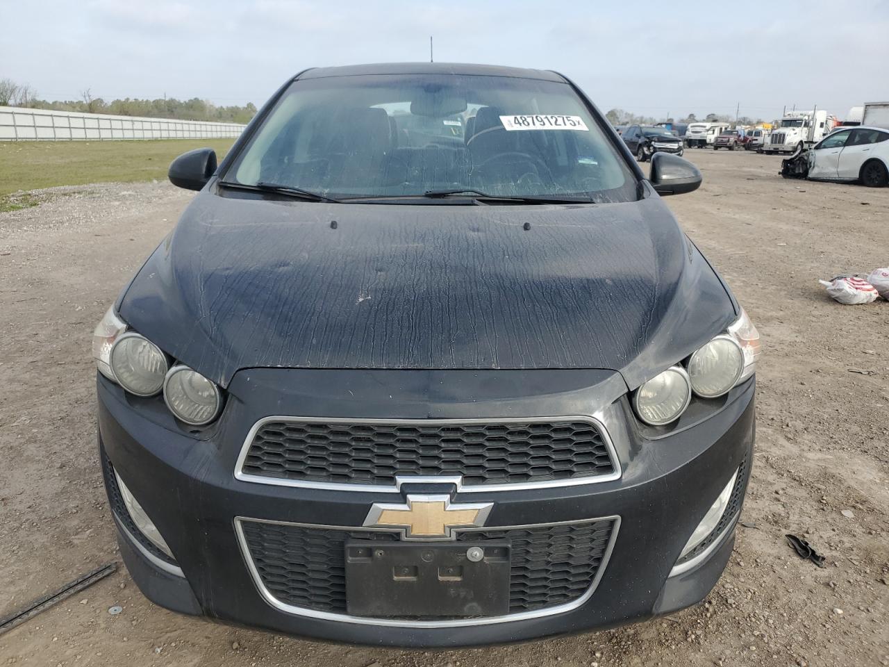 2014 Chevrolet Sonic VIN 1G1JG6SB2E4101857 Copart auction photo, rear end / minor dent/scratches damage thumbnail 5