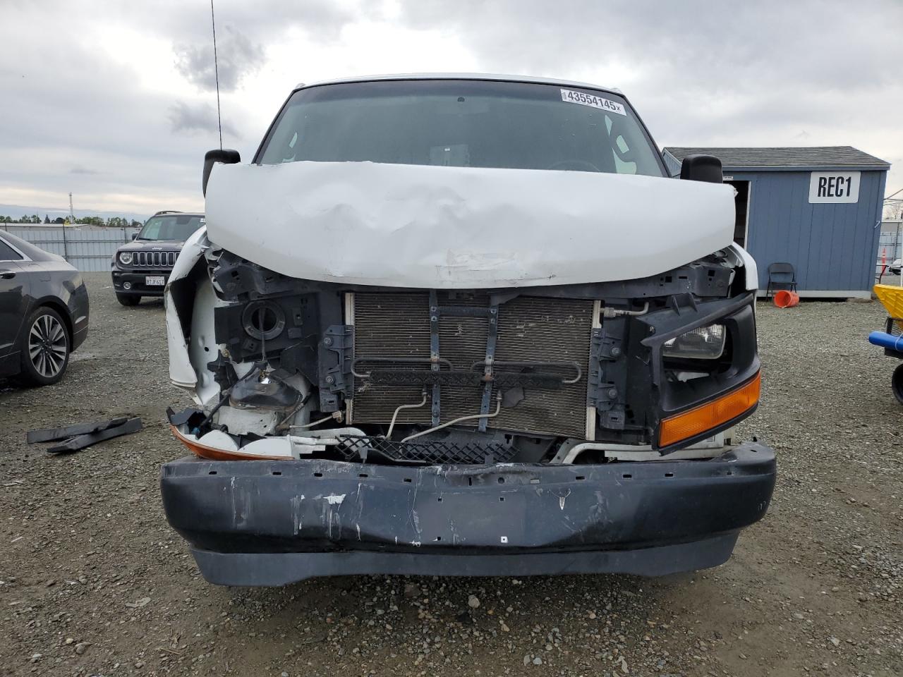 2017 Chevrolet Express VIN 1GCWGAFF9H1215390 Copart auction photo, front end / side damage thumbnail 5