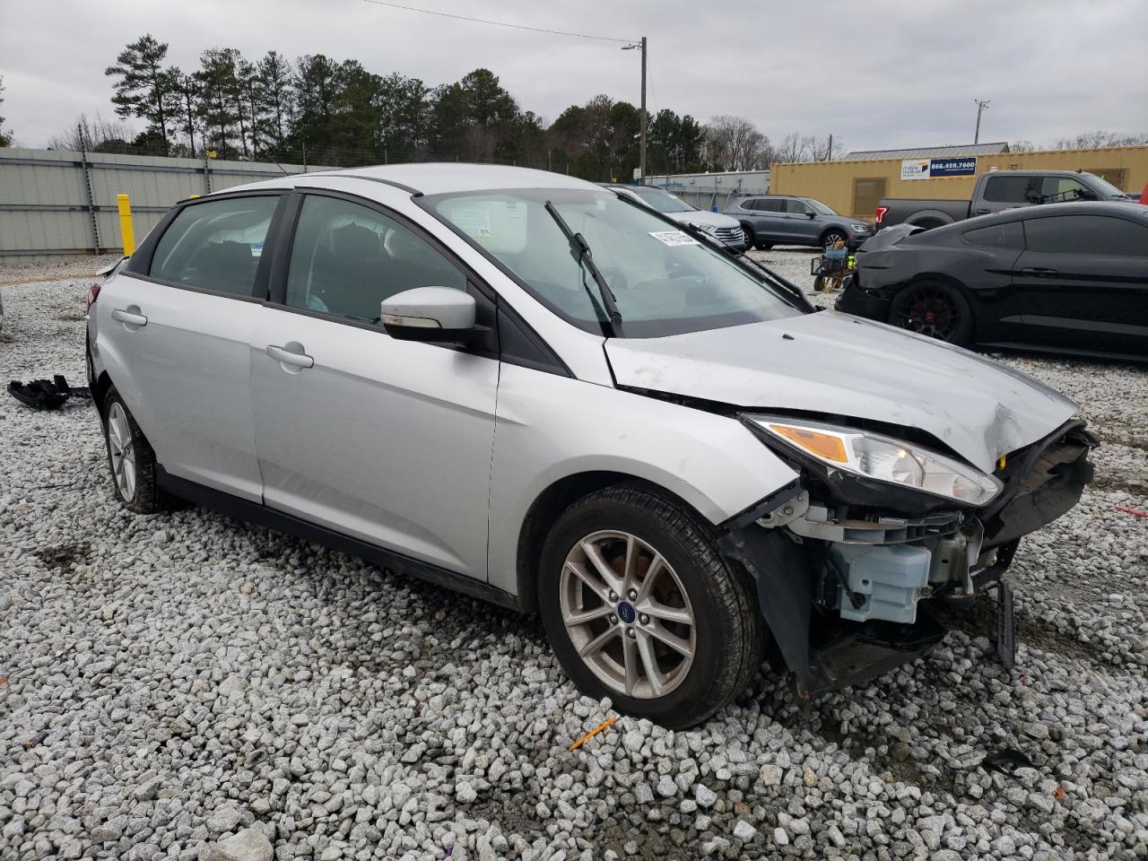 2017 Ford Focus VIN 1FADP3F22HL304308 Copart auction photo, all over / undercarriage damage thumbnail 4