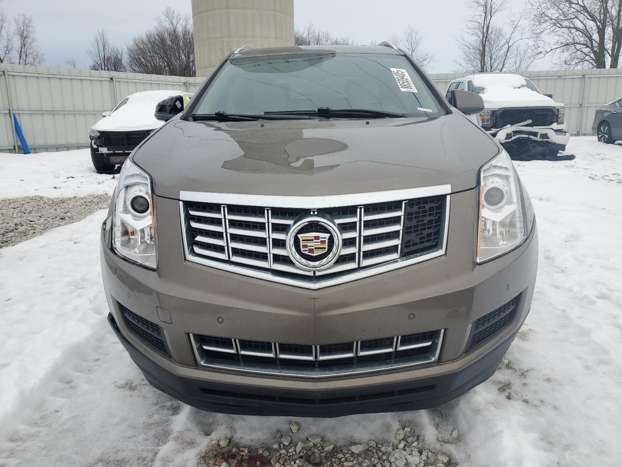 2014 Cadillac SRX VIN 3GYFNEE34ES573604 Copart auction photo, front end damage thumbnail 5