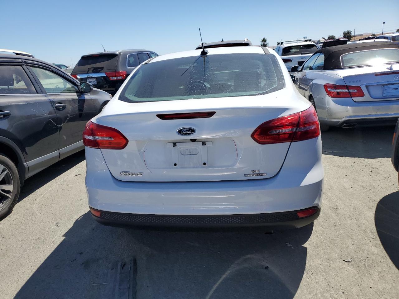 2015 Ford Focus VIN 1FADP3F23FL209723 Copart auction photo, side / rear end damage thumbnail 6
