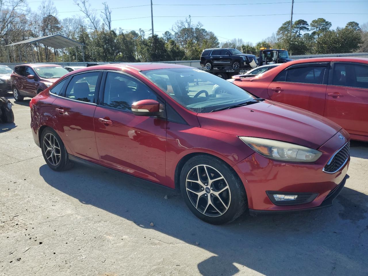2017 Ford Focus VIN 1FADP3H25HL337011 Copart auction photo, normal wear damage thumbnail 4