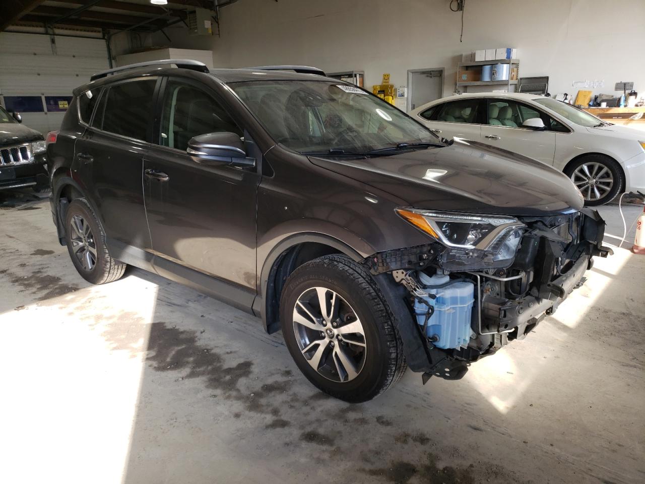 2017 Toyota RAV 4 VIN JTMRFREV3HJ104924 Copart auction photo, all over damage thumbnail 4