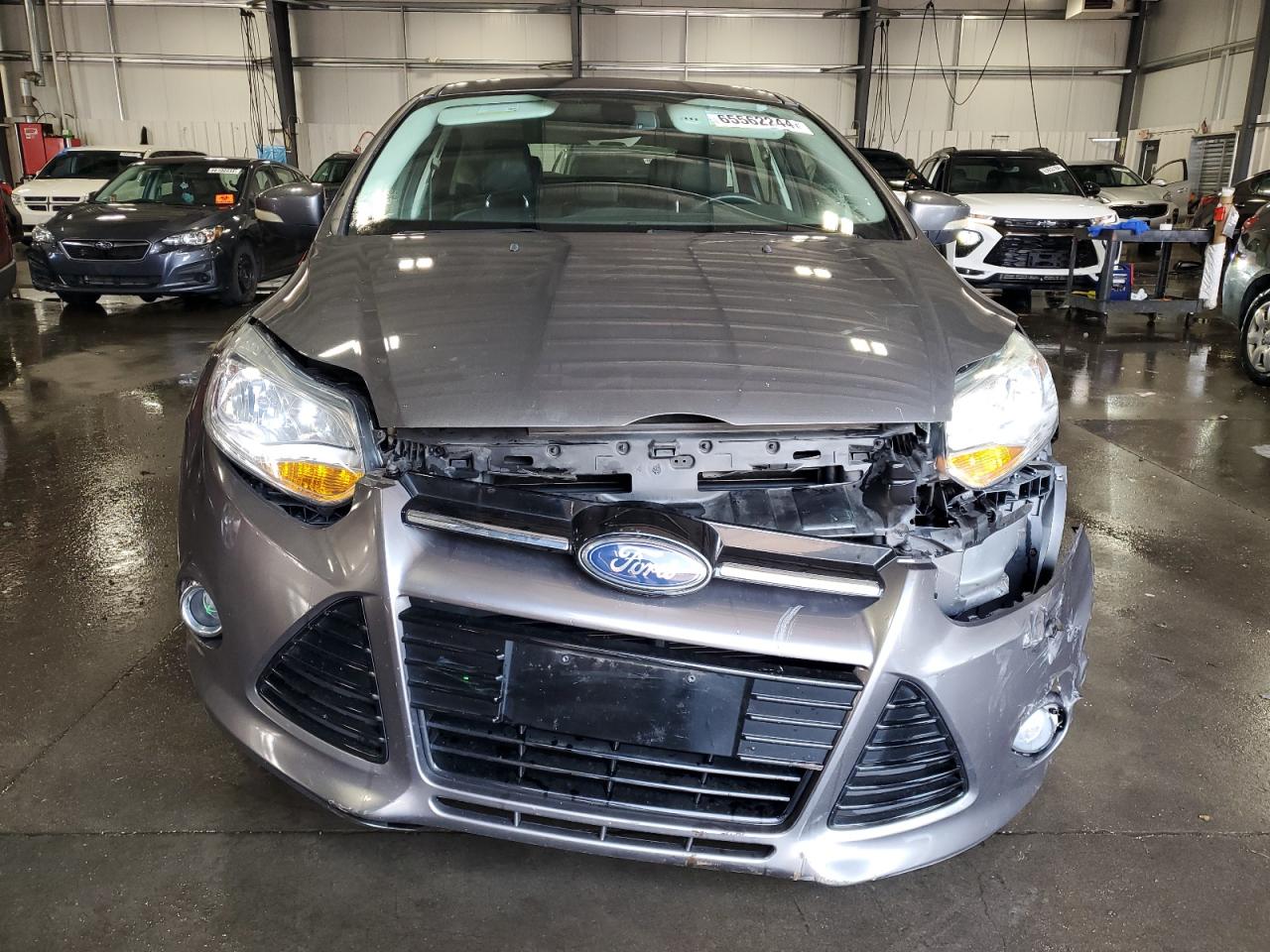 2012 Ford Focus VIN 1FAHP3M25CL313808 Copart auction photo, front end / side damage thumbnail 5