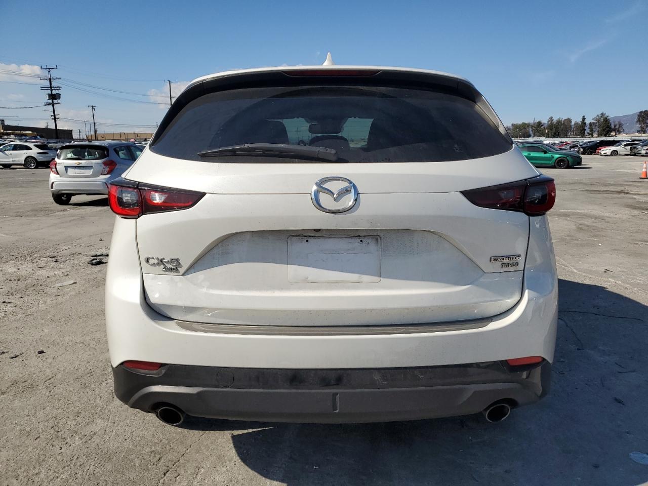 2022 Mazda CX-5 VIN JM3KFBAY5N0525299 Copart auction photo, front end / side damage thumbnail 6