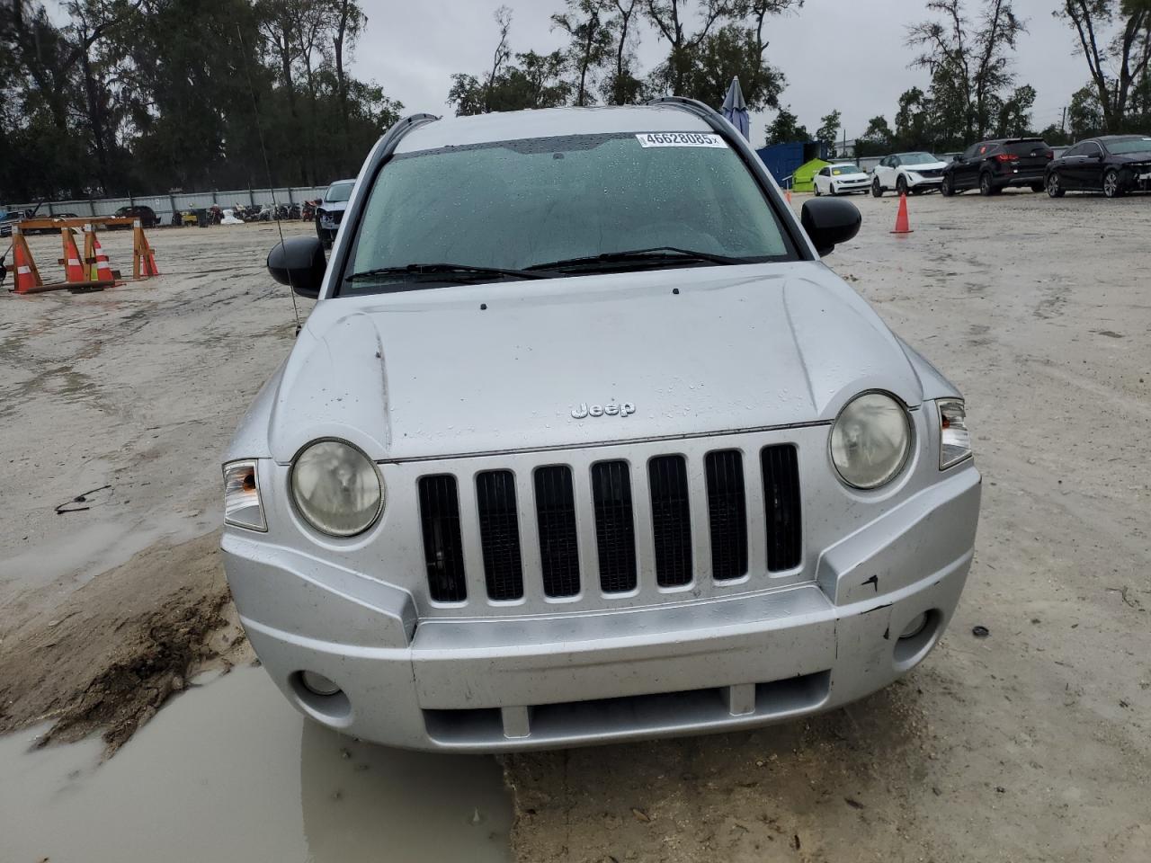 2010 Jeep Compass VIN 1J4NT1FA5AD676600 Copart auction photo, minor dent/scratches damage thumbnail 5