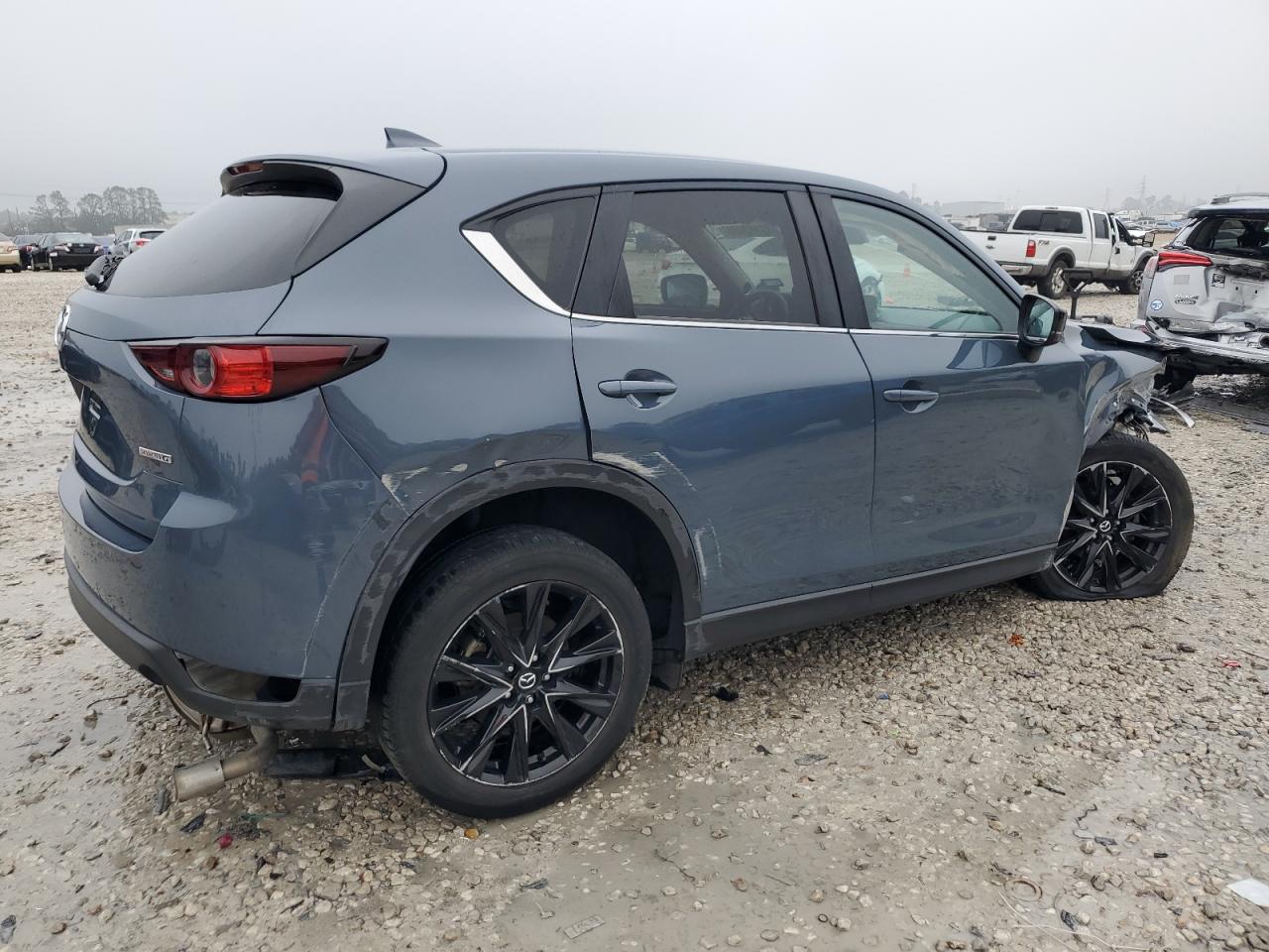 2021 Mazda CX-5 VIN JM3KFACM1M0387439 Copart auction photo, front end / side damage thumbnail 3