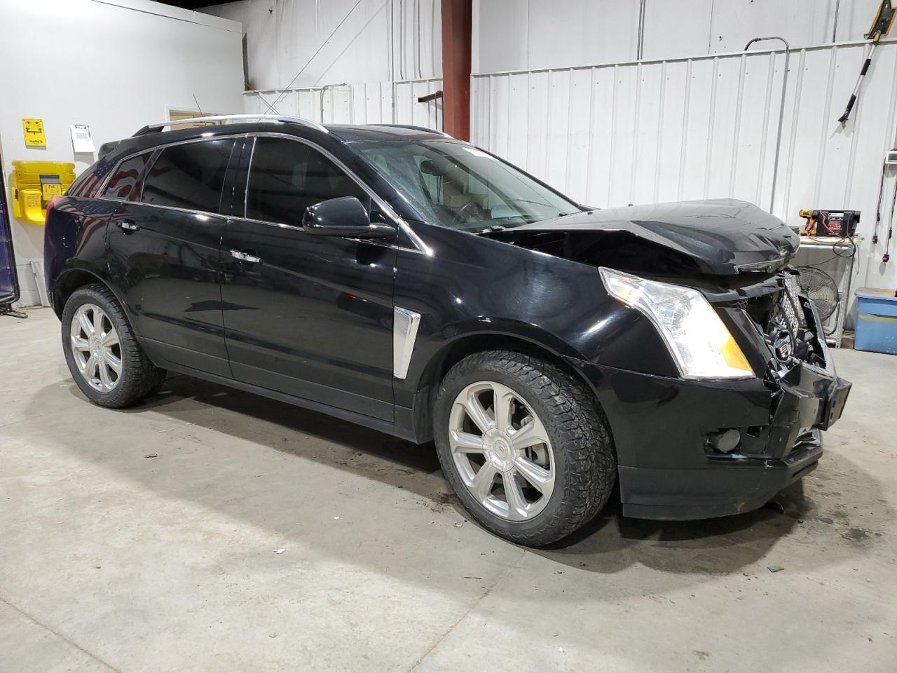 2015 Cadillac SRX VIN 3GYFNGE35FS617204 Copart auction photo, all over / mechanical damage thumbnail 4