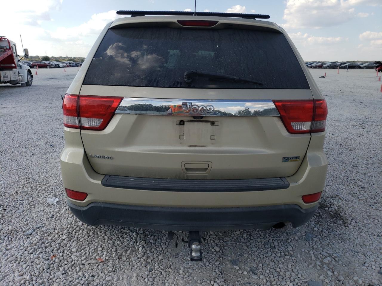 2012 Jeep Grand Cherokee VIN 1C4RJEAG2CC119703 Copart auction photo, front end damage thumbnail 6
