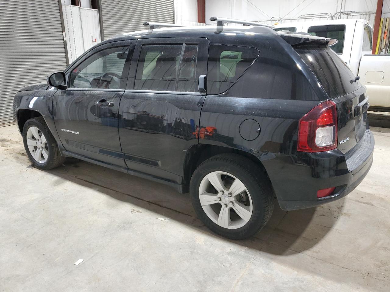 2016 Jeep Compass VIN 1C4NJDBBXGD759900 Copart auction photo, side damage thumbnail 2